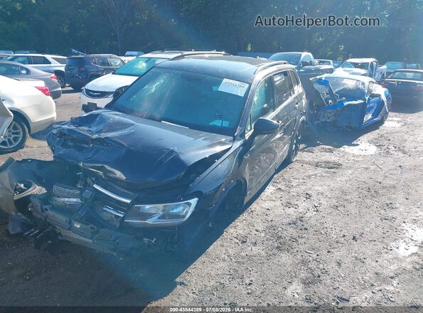 3VV2B7AX7MM021357 2021 VOLKSWAGEN TIGUAN Black Vista tres cuartos delantera izquierda