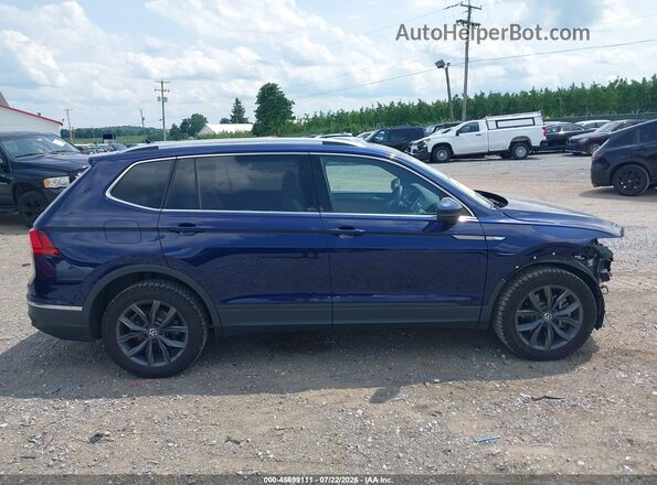 3VV2B7AX7NM124974 2022 VOLKSWAGEN TIGUAN Blue Vista interior trasera