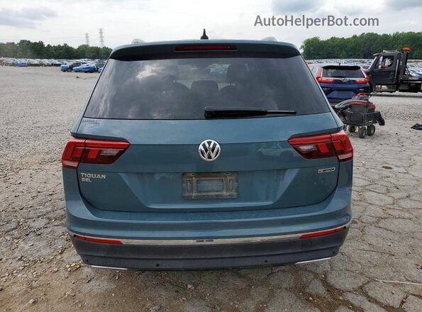 3VV2B7AX8LM089102 2020 VOLKSWAGEN TIGUAN Blue უკანა ხედი