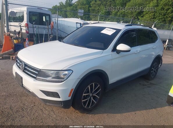 3VV2B7AX9MM075582 2021 VOLKSWAGEN TIGUAN White წინა მარცხენა ხედი სამი მეოთხედიდან
