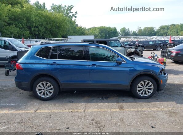 3VV2B7AXXKM038800 2019 VOLKSWAGEN TIGUAN Blue Vista interior trasera