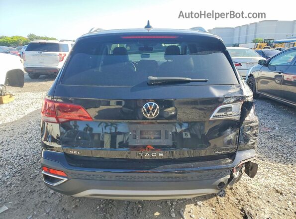3VV2X7B20NM033808 2022 VOLKSWAGEN TAOS Black Rear view