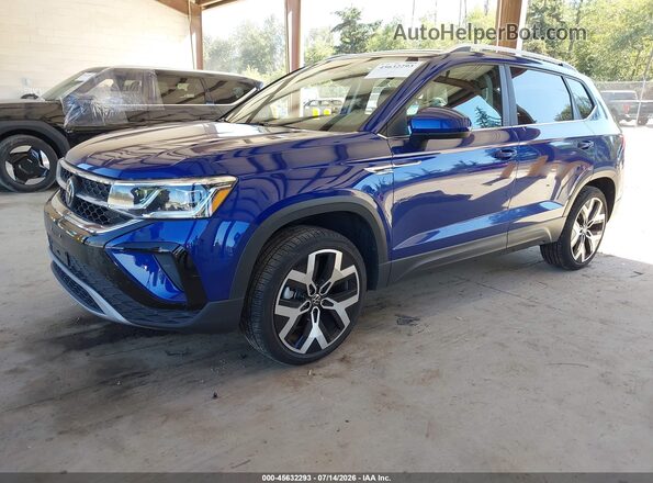 3VV2X7B20PM332508 2023 VOLKSWAGEN TAOS Blue Vista tres cuartos delantera izquierda