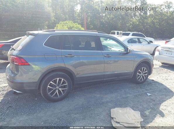 3VV3B7AX1KM030427 2019 VOLKSWAGEN TIGUAN Gray Rear interior view