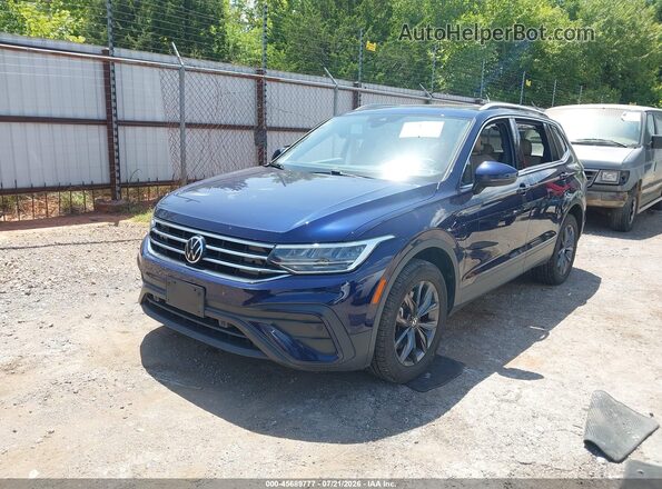 3VV3B7AX1NM090115 2022 VOLKSWAGEN TIGUAN Blue Vista tres cuartos delantera izquierda