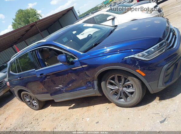 3VV3B7AX1NM090115 2022 VOLKSWAGEN TIGUAN Blue Vista interior trasera