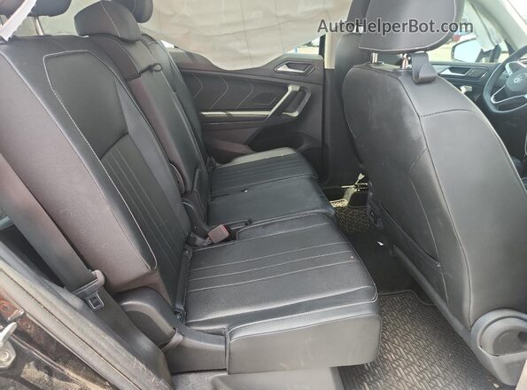 3VV3B7AX1PM117817 2023 VOLKSWAGEN TIGUAN Black Вид задньої частини салону