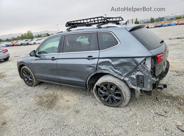 3VV3B7AX1RM061882 2024 VOLKSWAGEN TIGUAN Gray Trasero izquierdo