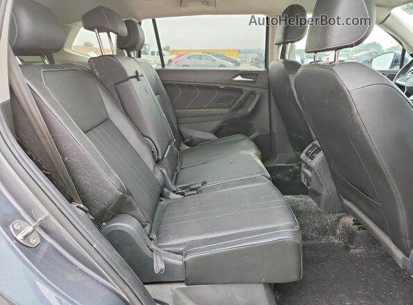 3VV3B7AX1RM061882 2024 VOLKSWAGEN TIGUAN Gray Vista interior trasera