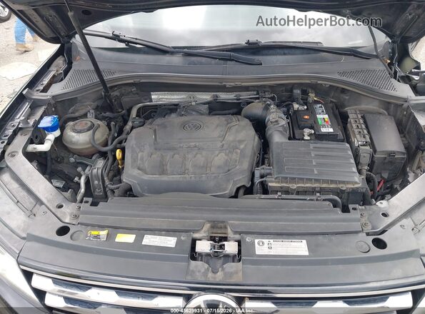 3VV3B7AX2JM188144 2018 VOLKSWAGEN TIGUAN Black Հետևի տեսք