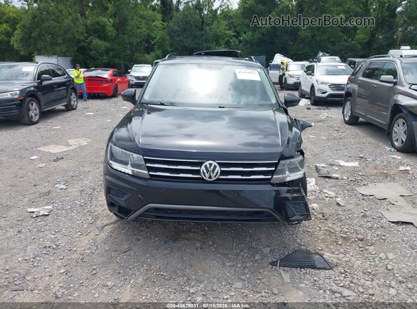 3VV3B7AX2JM188144 2018 VOLKSWAGEN TIGUAN Black Սալոնի հետևի տեսք