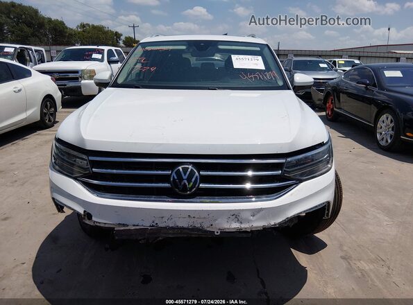 3VV3B7AX2NM104703 2022 VOLKSWAGEN TIGUAN White Vista interior trasera