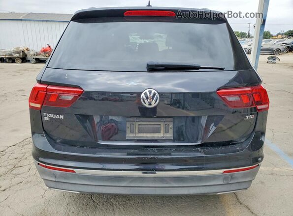 3VV3B7AX3JM002269 2018 VOLKSWAGEN TIGUAN Black Widok z tyłu
