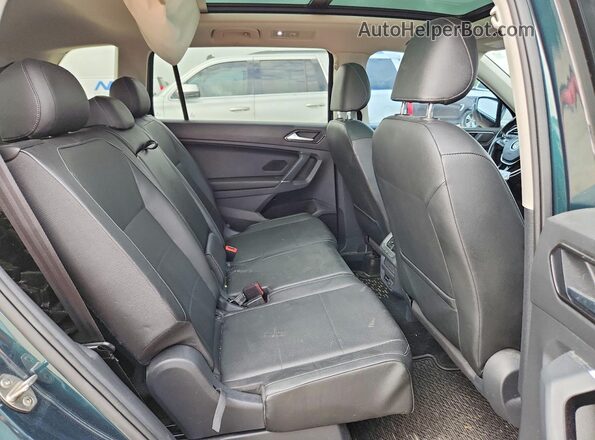 3VV3B7AX3JM013787 2018 VOLKSWAGEN TIGUAN Green Սալոնի հետևի տեսք