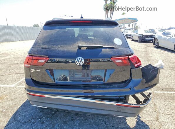 3VV3B7AX3MM111450 2021 VOLKSWAGEN TIGUAN Black Rear view