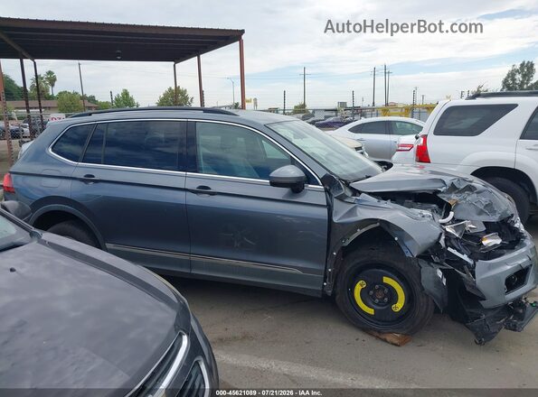 3VV3B7AX4JM002622 2018 VOLKSWAGEN TIGUAN Gray Vista interior trasera