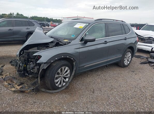 3VV3B7AX6JM185733 2018 VOLKSWAGEN TIGUAN Gray Vista tres cuartos delantera izquierda