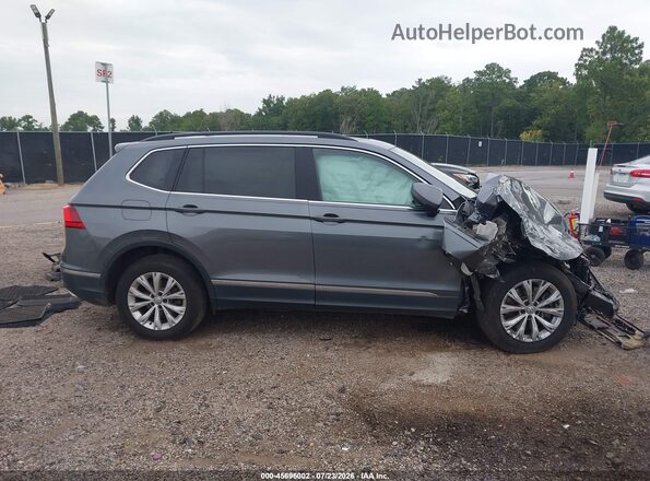 3VV3B7AX6JM185733 2018 VOLKSWAGEN TIGUAN Gray Vista interior trasera