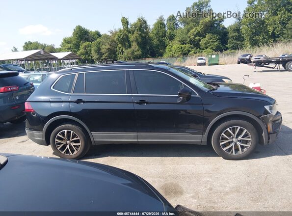 3VV3B7AX6KM136923 2019 VOLKSWAGEN TIGUAN Black Widok wnętrza z tyłu