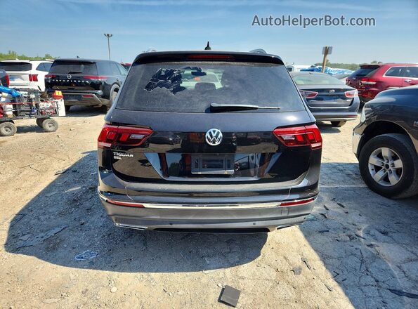 3VV3B7AX6KM142186 2019 VOLKSWAGEN TIGUAN Black Rear view