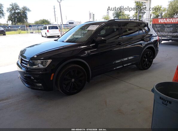 3VV3B7AX7LM065118 2020 VOLKSWAGEN TIGUAN Black Передня ліва чверть