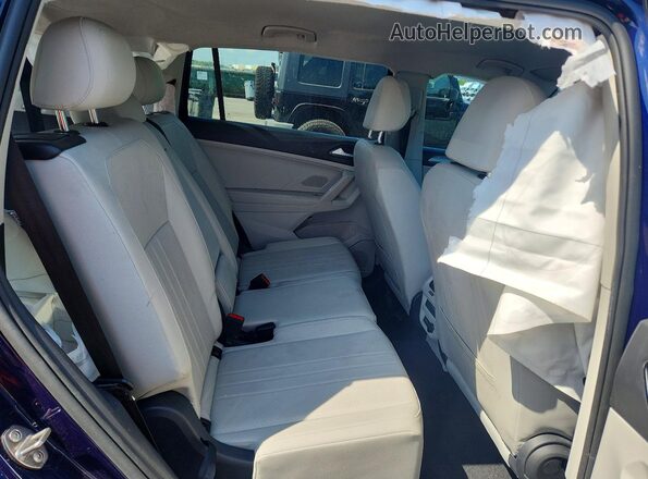 3VV3B7AX8PM045675 2023 VOLKSWAGEN TIGUAN Синий Вид задней части салона