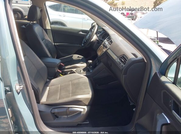 3VV3B7AX9LM052855 2020 VOLKSWAGEN TIGUAN Зеленый Вид салона спереди