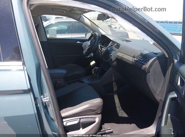 3VV3B7AX9LM058378 2020 VOLKSWAGEN TIGUAN Blue Front interior view