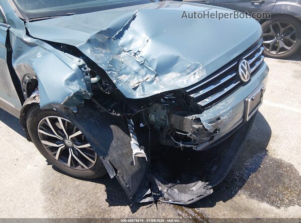 3VV3B7AX9LM058378 2020 VOLKSWAGEN TIGUAN Blue Front view