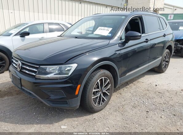 3VV3B7AX9MM078633 2021 VOLKSWAGEN TIGUAN Black Առջևի ձախ երեք քառորդ տեսարան