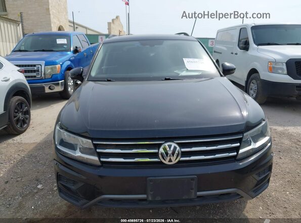 3VV3B7AX9MM078633 2021 VOLKSWAGEN TIGUAN Black Սալոնի հետևի տեսք