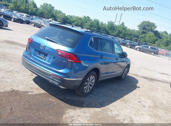 3VV3B7AXXJM039335 2018 VOLKSWAGEN TIGUAN Light Blue Задняя правая четверть