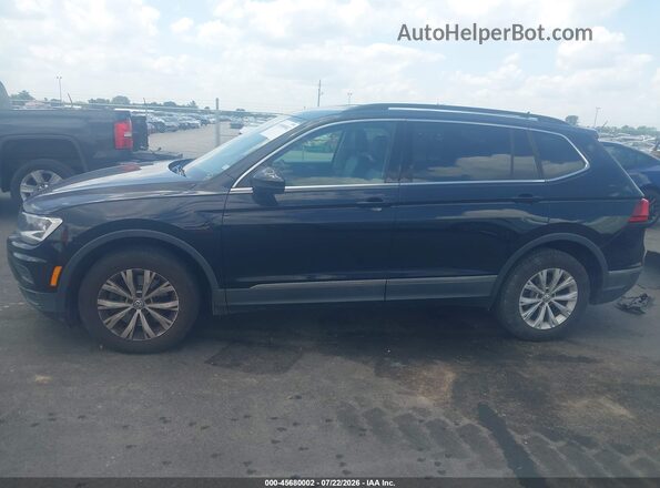 3VV3B7AXXJM067720 2018 VOLKSWAGEN TIGUAN Black უკანა სალონის ხედი