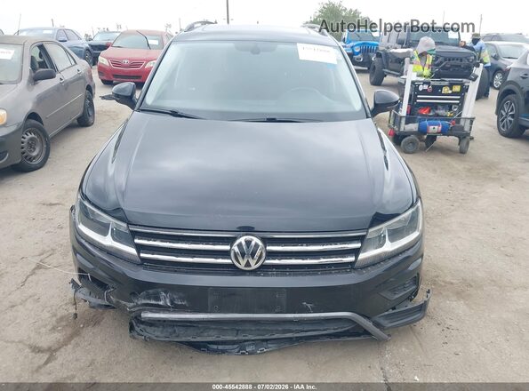 3VV3B7AXXLM046434 2020 VOLKSWAGEN TIGUAN Черный Вид задней части салона