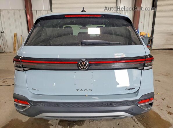 3VV4C7B22TM013190 2026 VOLKSWAGEN TAOS Blue Հետևի տեսք