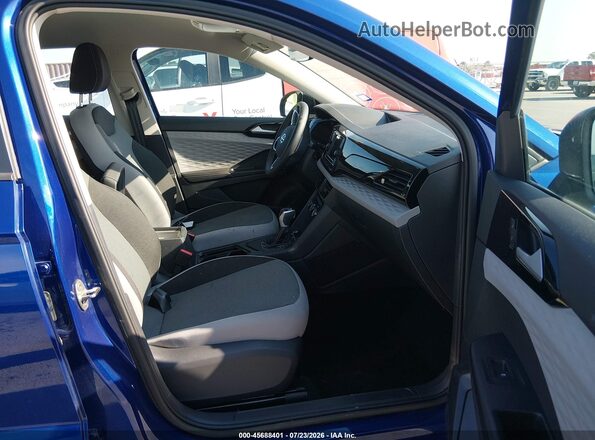 3VV5X7B21RM099383 2024 VOLKSWAGEN TAOS Blue წინა სალონის ხედი