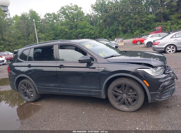 3VV8B7AX4NM087084 2022 VOLKSWAGEN TIGUAN Black Вид задньої частини салону