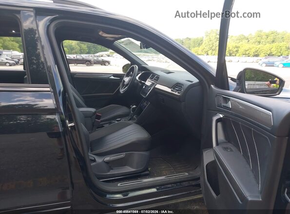3VV8B7AX9RM010393 2024 VOLKSWAGEN TIGUAN Black Widok wnętrza z przodu