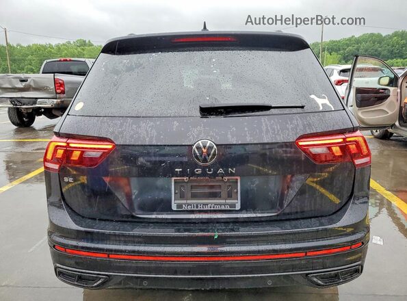 3VVCB7AX1PM032864 2023 VOLKSWAGEN TIGUAN Black Rear view