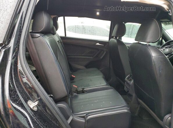 3VVCB7AX1PM032864 2023 VOLKSWAGEN TIGUAN Black Rear interior view