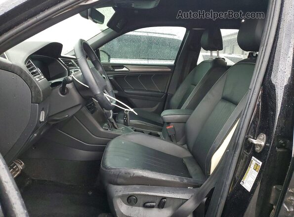 3VVCB7AX1PM032864 2023 VOLKSWAGEN TIGUAN Black Front interior view