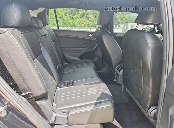 3VVCB7AX2NM118486 2022 VOLKSWAGEN TIGUAN Black Vista interior trasera