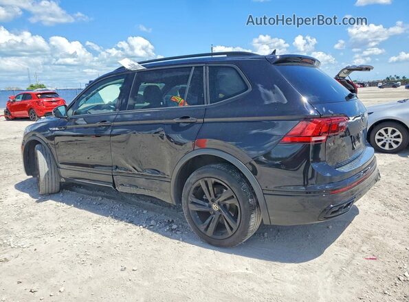 3VVCB7AX3PM118693 2023 VOLKSWAGEN TIGUAN Black Trasero izquierdo