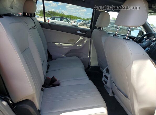 3VVCB7AX3PM118693 2023 VOLKSWAGEN TIGUAN Black Vista interior trasera
