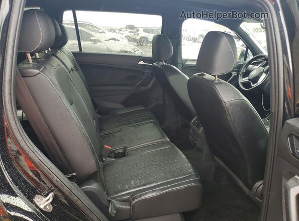 3VVCB7AX4PM124521 2023 VOLKSWAGEN TIGUAN Черный Вид задней части салона
