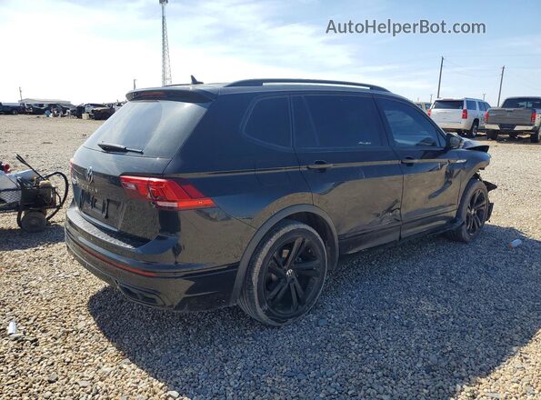 3VVCB7AX9PM035012 2023 VOLKSWAGEN TIGUAN Black Trasero derecho
