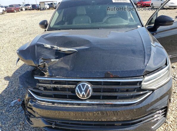 3VVCB7AX9PM035012 2023 VOLKSWAGEN TIGUAN Black Vista del compartimento del motor