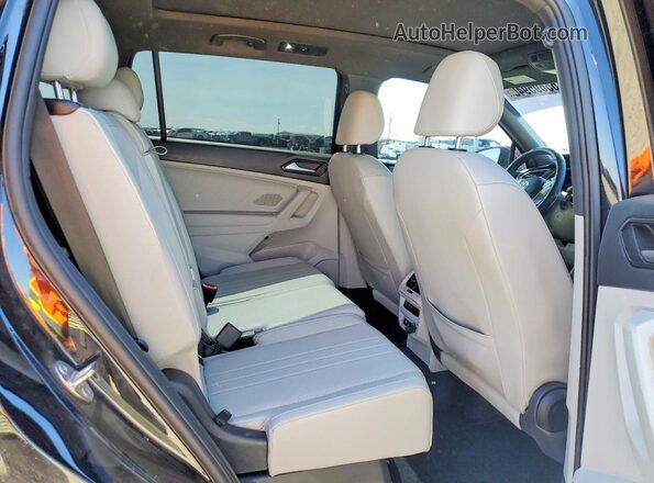 3VVCB7AX9PM035012 2023 VOLKSWAGEN TIGUAN Black Vista interior trasera