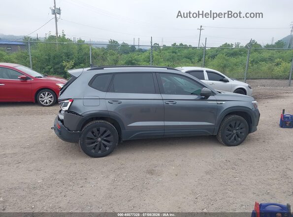 3VVCX7B23NM000502 2022 VOLKSWAGEN TAOS Gray Vista interior trasera