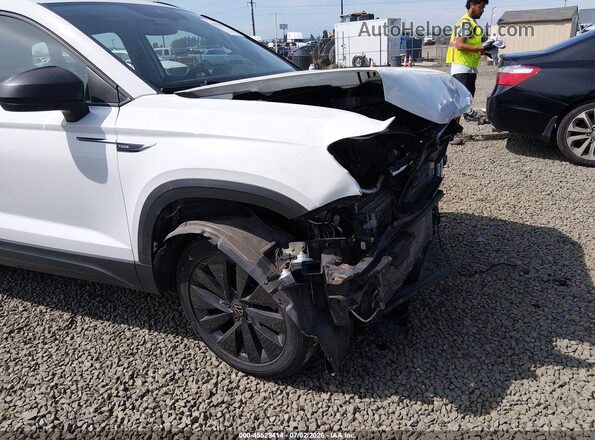 3VVDX7B28PM321748 2023 VOLKSWAGEN TAOS Белый Вид задней части салона